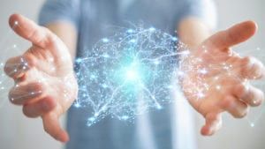 Hands open with rendered neurons in between